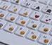 teclado com emojis desenhados junto com as letras