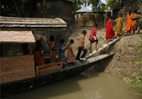 Imagem de escola flutuante em Bangladesh. Crdito: Shidhulai Swanirvar Sangstha/Divulgao